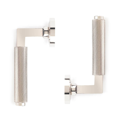 Front and rear view of polished nickel knurled lever door handle pair with textured knurled grip.