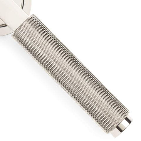 Close-up detail of polished nickel knurled lever door handle showing textured knurled finish.