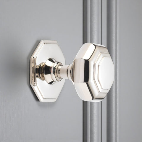 Polished Nickel Octagonal Centre Door Knob On Grey Door