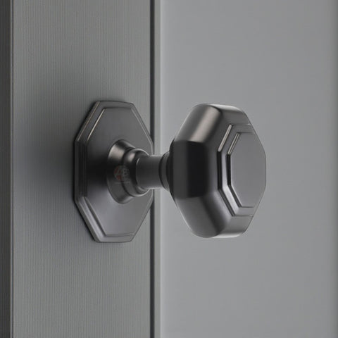 Powder Coated Black Octagonal Centre Door Knob On Grey Door