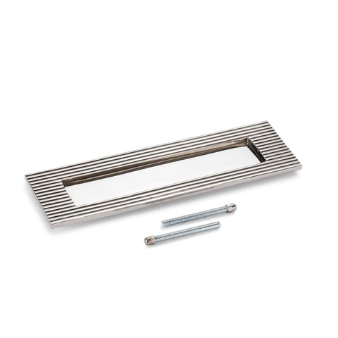 Reeded polished nickel letter box plate with fixing bolts on a white background