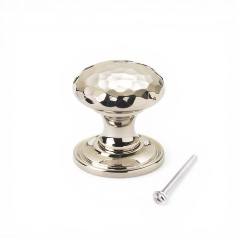 32mm solid polished nickel hammered cupboard knob with plain backplate and fixing screw on white background