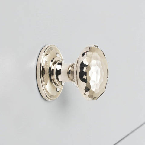32mm solid polished nickel hammered cupboard knob with plain backplate fitted to grey cabinet door