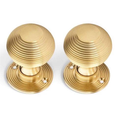 Pair of solid brass satin brass Victorian beehive door knobs