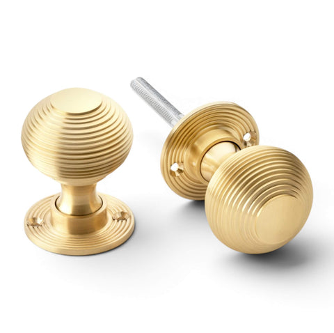 Solid brass satin brass reeded beehive mortice and rim door knobs