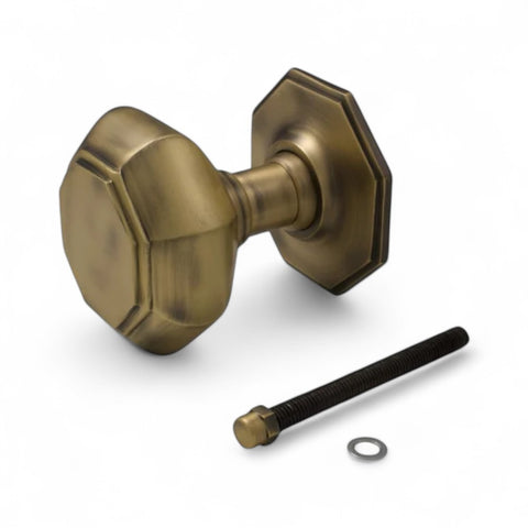 Very large matt antique brass octagonal centre door knob with fixing bolt