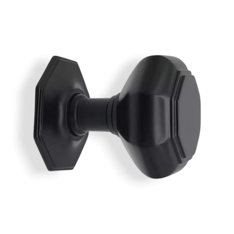 Side profile of solid brass powder coated black octagonal centre door knob with octagonal backplate