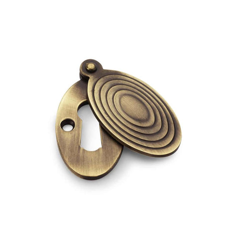 Solid Brass Reeded Oval Escutcheon - Antique Brass